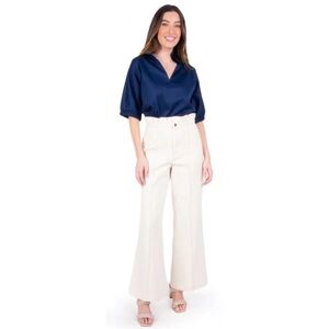 Emily McCarthy Ruffle Flare pants in Gardenia (ivory)